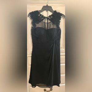 Beautiful black dress with flower detail. Only worn once!